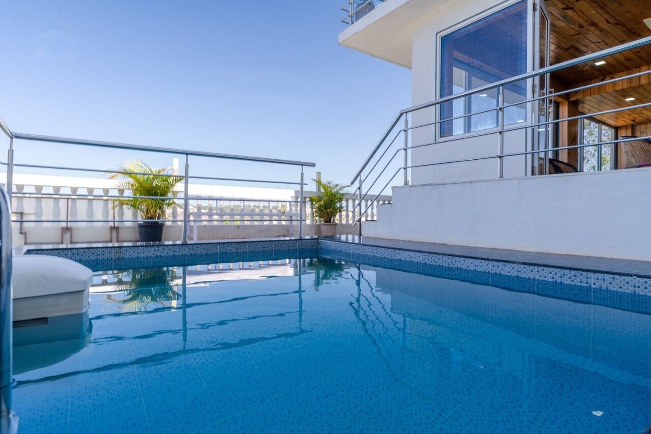 Private pool with valley views by day